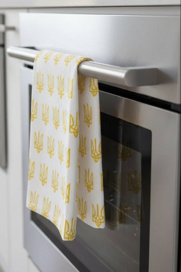 White paper with yellow Ukrainian emblem pattern